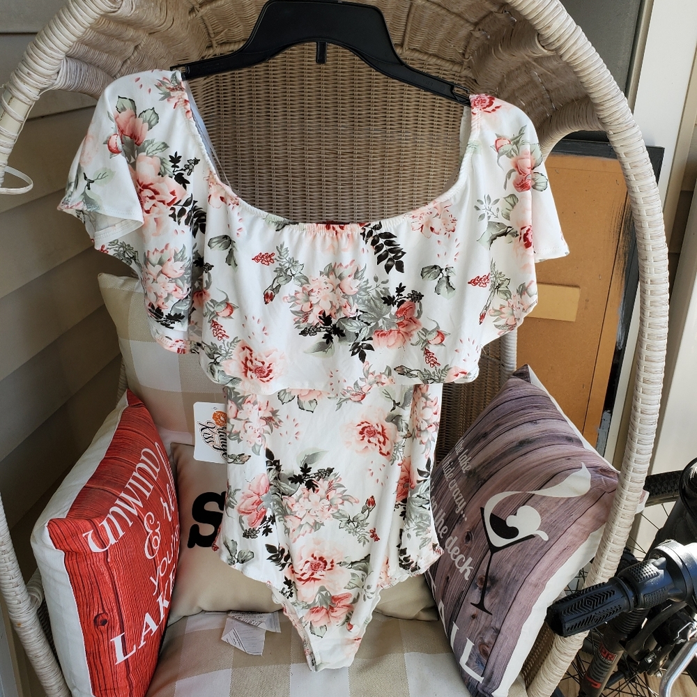 2 green and white bathing suits